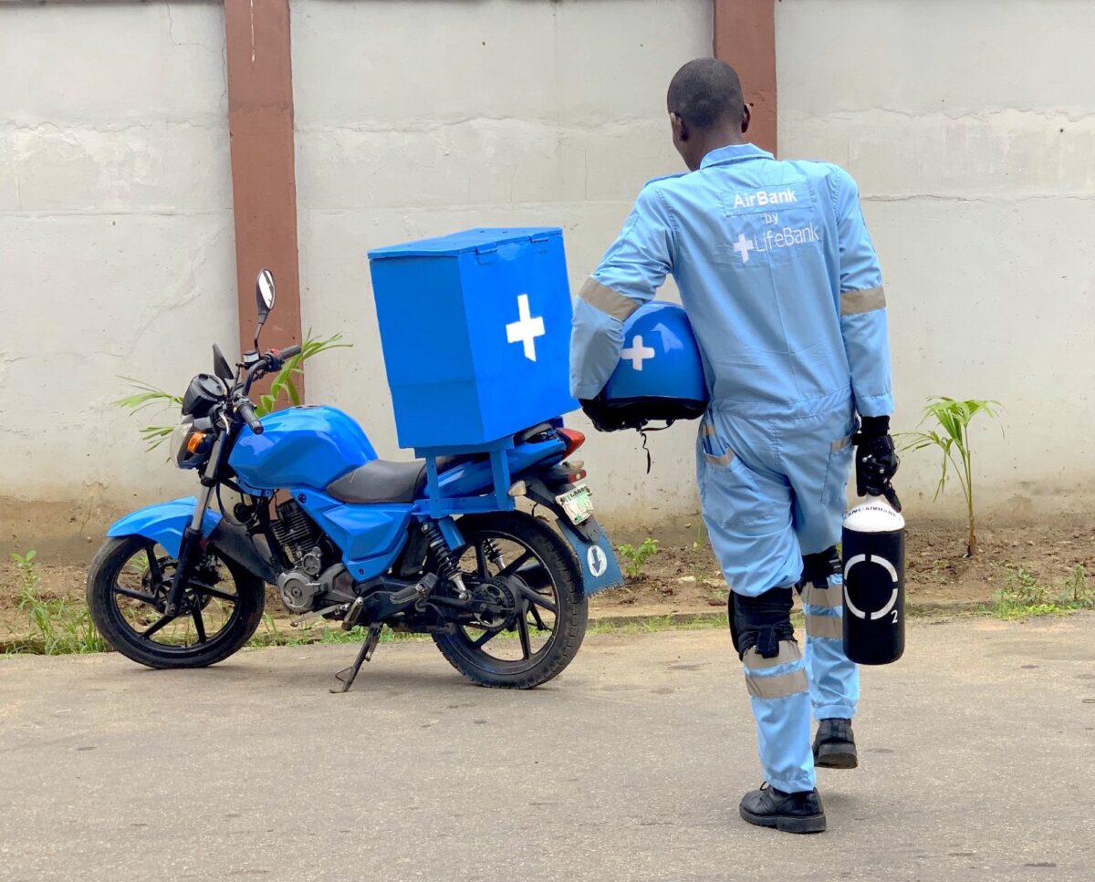 An AirBank by LifeBank Dispatch Rider carrying a 1m3 cylinder of oxygen ...